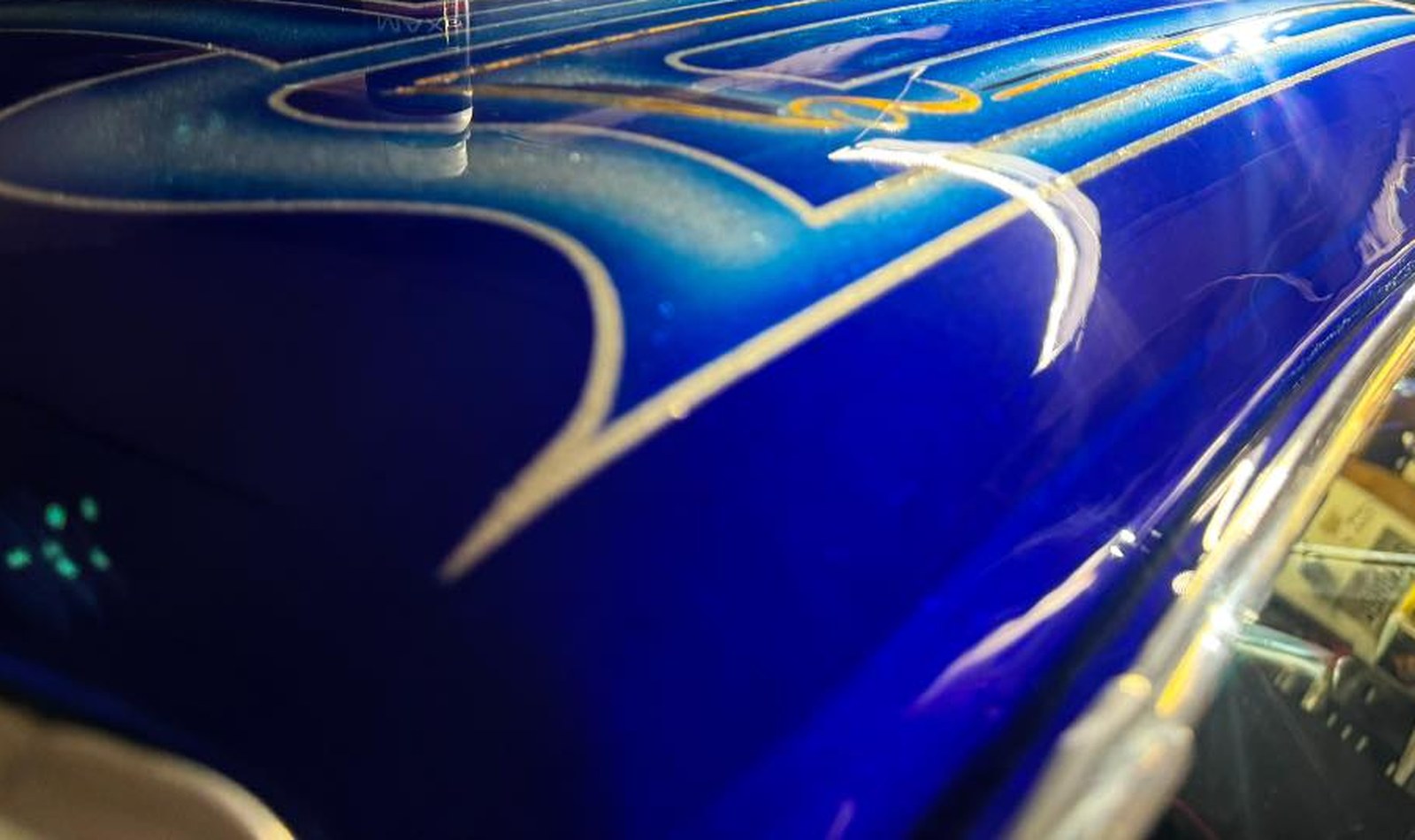 Glossy coated blue paint with clean light reflections