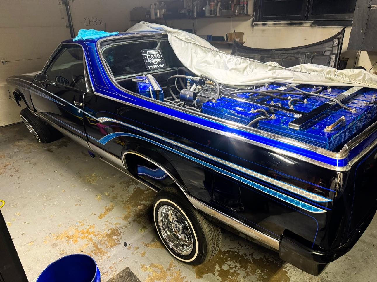 Blue lowrider show car after detailing